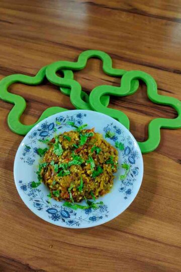 Baingan Bharta is a traditional Indian dish known for its smoky flavor and rustic charm.