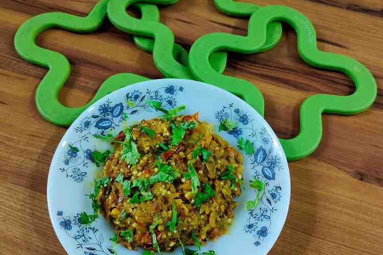 Baingan Bharta is a traditional Indian dish known for its smoky flavor and rustic charm.