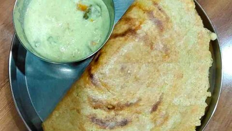 Adai is a traditional South Indian savory pancake. It's made with rice and dals and spiced with red chilies. Enjoy this delicious and nutritious dish, perfect for breakfast or a wholesome snack.
