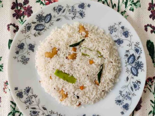 Coconut rice, or "Thengai Sadam," is a traditional Tamil Nadu dish that blends the rich flavor of fresh coconut with aromatic spices.