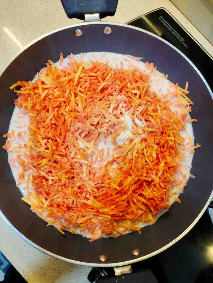 Gajar with Milk Add grated gajar and milk to a heavy bottomed pan