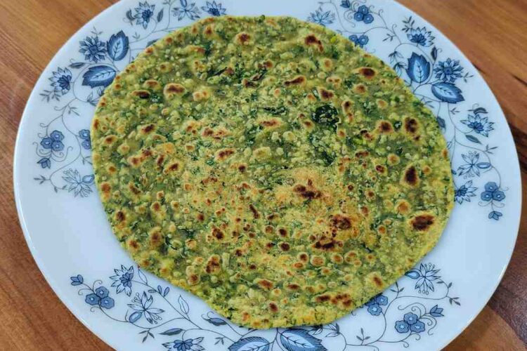 Methi Paratha is a flavorful and nutritious Indian flatbread made with fenugreek leaves and sautéed onions.