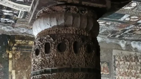 Carved pillar at Ajanta