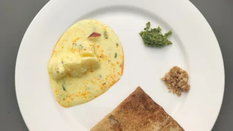 Himachali aloo palda served with lushke, a thin crepe, in Dalhousie
