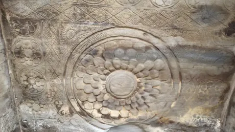 Lotus carving on a Masroor ceiling