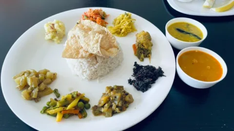 Traditional Assamese thali at Jajabor near Kaziranga